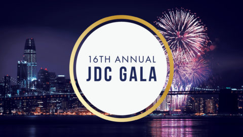 San Francisco downtown night view with firework. JDC gala logo is placed in the middle.