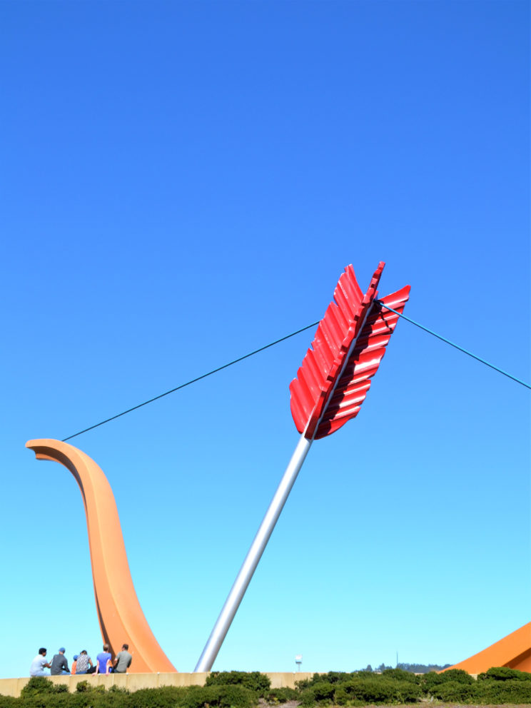 A crowd sitting next to Cupid's Span