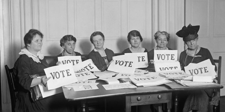 A picture of National League of Women Voters hold up signs reading, 'VOTE', Sept. 17, 1924. Millions of women voted in 1920 and 1924, but in a lower proportion than men.