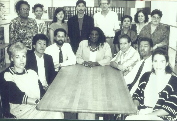 Eva in her early legal career, pictured with staff at Lawyers’ Committee