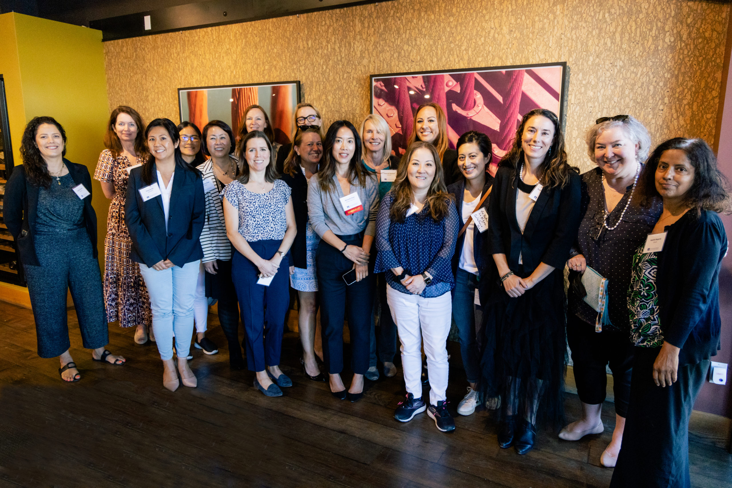 WGCL-2 GROUP PHOTO OF WOMEN'S GENERAL COUNSEL LUNCHEON PARTICIPANTS.