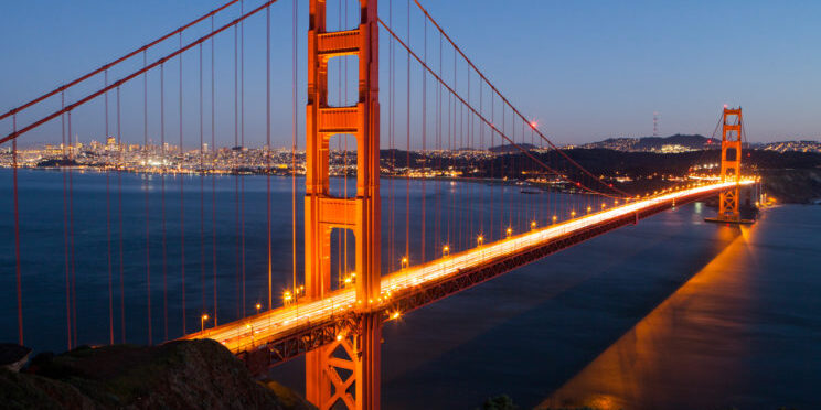 A view at duskof the Golden Gate Bridge towards downtown San Francisco.
